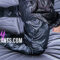 Women’s glossy black raincoat with zip closure and water-resistant finish